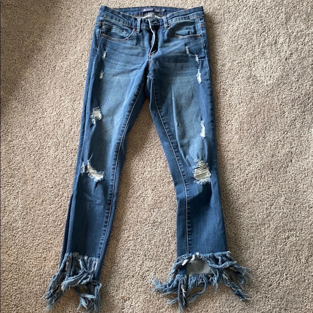 Frayed fringe hem denim